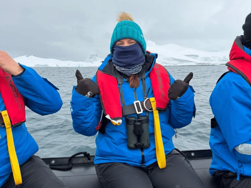 Lizzy aboard a Zodiac during her Antarctica expedition cruise