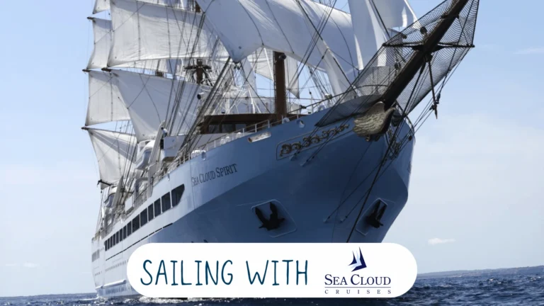 Sea Cloud Spirit sailing under full white sails on a blue sea