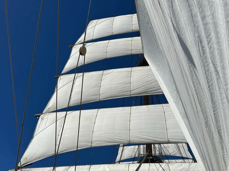 Traditional white sails set above the deck of Sea Cloud Spirit