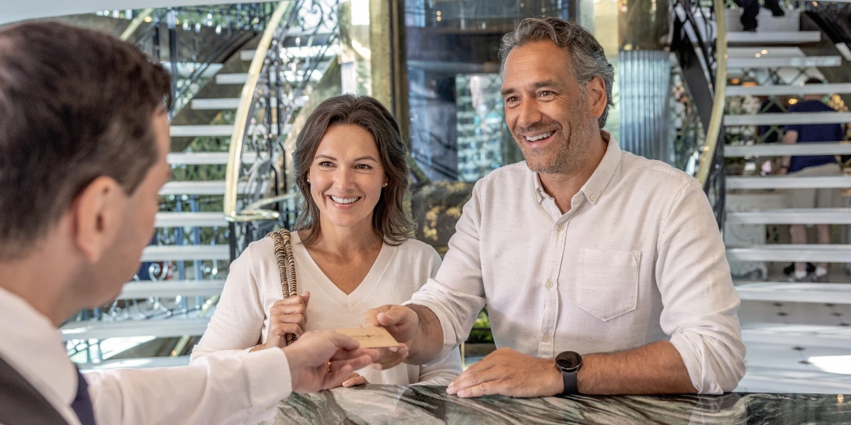 Uniworld Boutique River Cruises guests receiving personalised service onboard luxury ship