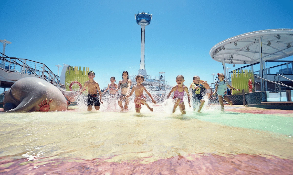 Children enjoying the splash park aboard a Royal Caribbean family cruise