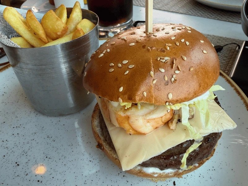 Surf 'n' Turf burger with wagyu beef and lobster served at Waves Grill aboard Oceania Cruises' Sirena.