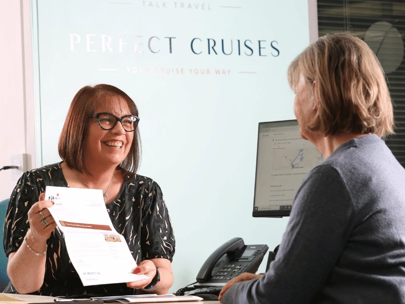 Perfect Cruises specialist Sarah discussing holiday options with a client