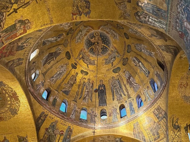 Golden mosaics inside St Mark’s Basilica during Uniworld’s private evening visit